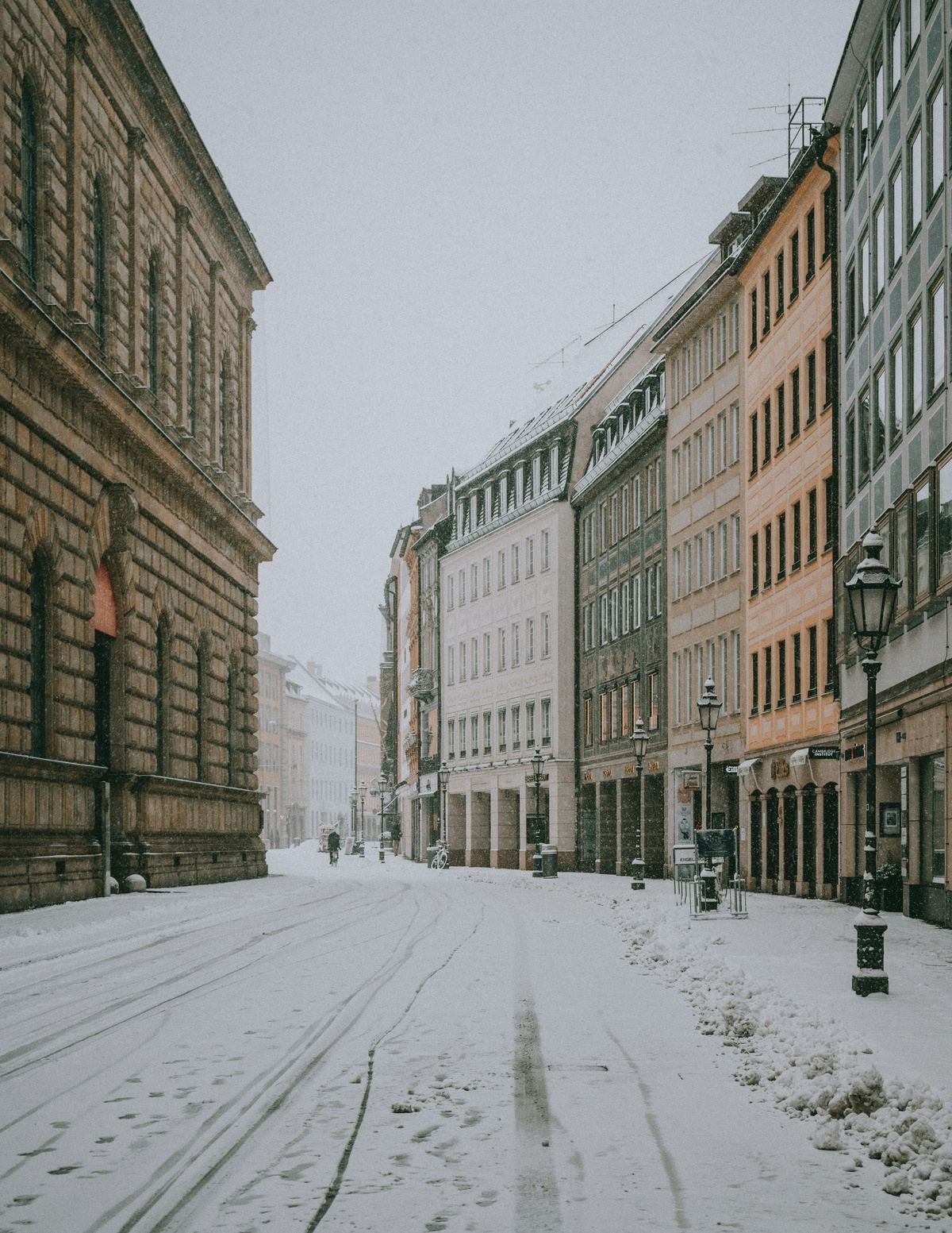 A quiet European street after snowfall